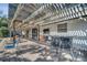 Back patio with brick pavers, pergola, outdoor tv and bar, perfect for entertaining at 2417 Liela Lee Ct, Ocoee, FL 34761