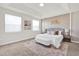 Inviting main bedroom with tray ceiling, carpet, and decorated accent wall at 2525 Annacella Ave, Kissimmee, FL 34741