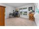 Bright bedroom with carpeted floors and a workspace at 264 Citrus Pointe Dr, Haines City, FL 33844