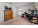 Cozy bedroom featuring a dresser and home office setup at 264 Citrus Pointe Dr, Haines City, FL 33844