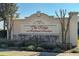 Elegant community sign for 'The Ridge at Highland Meadows' surrounded by manicured landscaping at 264 Citrus Pointe Dr, Haines City, FL 33844