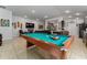 Teal pool table in a Gathering-friendly living space at 264 Citrus Pointe Dr, Haines City, FL 33844