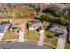 Aerial view of the house and surrounding neighborhood at 2715 Rismen Ct, Kissimmee, FL 34743