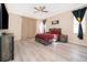 Primary bedroom with king bed and lots of natural light at 2715 Rismen Ct, Kissimmee, FL 34743