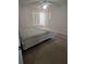 Bedroom with neutral carpet, a ceiling fan, and bright natural light from the windows at 2741 N Poinciana Blvd # 43, Kissimmee, FL 34746