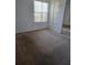 Bedroom with neutral carpet and good natural light at 2741 N Poinciana Blvd # 43, Kissimmee, FL 34746