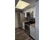 Kitchen showcasing stainless steel appliances, granite countertops, and white cabinets at 2741 N Poinciana Blvd # 43, Kissimmee, FL 34746