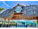 Latitude Beach Club entrance featuring tropical architecture and a view of the amenities at 306 Hang Loose Way, Daytona Beach, FL 32124