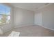 Bright bedroom with a large window, and double door closet, providing lots of natural light at 306 Hang Loose Way, Daytona Beach, FL 32124
