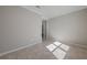 Well-lit bedroom with tile flooring, neutral walls, and ample natural light at 306 Hang Loose Way, Daytona Beach, FL 32124