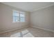 Bright bedroom with a large window offering plenty of natural light and neutral walls at 306 Hang Loose Way, Daytona Beach, FL 32124
