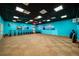 Bright gym featuring rows of stationary bikes and blue accent walls at 306 Hang Loose Way, Daytona Beach, FL 32124