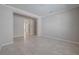 Spacious living room featuring tile floors and neutral paint, ready for personalization at 306 Hang Loose Way, Daytona Beach, FL 32124