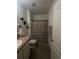 Small bathroom with shower/tub combo and updated vanity at 3181 Serendipity Way, Davenport, FL 33896