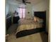 Bedroom with queen-size bed and window at 3181 Serendipity Way, Davenport, FL 33896