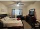 Spacious bedroom with a king-size bed and plenty of closet space at 3181 Serendipity Way, Davenport, FL 33896