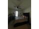 Comfortable bedroom with a king-size bed and large window at 3181 Serendipity Way, Davenport, FL 33896