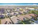 Aerial view of a beautiful community with single-Gathering homes and a lake at 362 Via Torrente Dr, Kissimmee, FL 34759