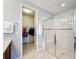 Bathroom featuring a walk-in shower and spacious closet at 362 Via Torrente Dr, Kissimmee, FL 34759