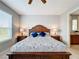 Bright bedroom with king-size bed and en-suite bathroom access at 362 Via Torrente Dr, Kissimmee, FL 34759