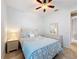 Bedroom with a queen-size bed and ceiling fan at 362 Via Torrente Dr, Kissimmee, FL 34759