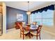 Kitchen dining area with table and chairs near window at 362 Via Torrente Dr, Kissimmee, FL 34759