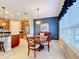 Kitchen dining area with table and chairs near window at 362 Via Torrente Dr, Kissimmee, FL 34759