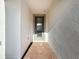 Front entry with gray door and brick tile flooring at 362 Via Torrente Dr, Kissimmee, FL 34759