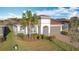 Single-story home with gray garage door and brick paver driveway at 362 Via Torrente Dr, Kissimmee, FL 34759