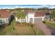 Single-story house with palm trees and landscaped yard at 362 Via Torrente Dr, Kissimmee, FL 34759