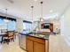 Island kitchen with stainless steel appliances and granite countertops at 362 Via Torrente Dr, Kissimmee, FL 34759