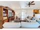 Living room with sectional sofa and view to kitchen at 362 Via Torrente Dr, Kissimmee, FL 34759