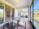 Screened porch with view into kitchen and backyard at 362 Via Torrente Dr, Kissimmee, FL 34759