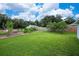 Large backyard with garden and shed at 3661 Se 131St Pl, Belleview, FL 34420