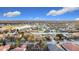 An aerial perspective shows a community with a lake, featuring cozy houses and inviting streetscapes at 3841 Golden Knot Dr, Kissimmee, FL 34746