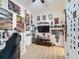 Gaming and collection themed bedroom includes shelves, posters, gaming chair, and an entertainment center at 3841 Golden Knot Dr, Kissimmee, FL 34746