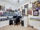 Unique themed bedroom with shelves filled with figures, posters, and a comfortable gaming setup at 3841 Golden Knot Dr, Kissimmee, FL 34746