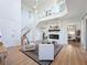 Bright and open floor plan of the living room with a modern fireplace at 3841 Golden Knot Dr, Kissimmee, FL 34746