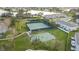 Community tennis and basketball courts set in a beautiful neighborhood near a lake at 3841 Golden Knot Dr, Kissimmee, FL 34746