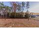 Spacious backyard with a treeline offering natural privacy at 386 Marion Oaks Trl, Ocala, FL 34473