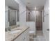 Bathroom boasts granite countertop and a large shower at 386 Marion Oaks Trl, Ocala, FL 34473