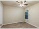 Bright bedroom with ceiling fan, wood-look floors, and a window at 386 Marion Oaks Trl, Ocala, FL 34473