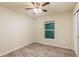 Bedroom featuring wood-look floors and a window at 386 Marion Oaks Trl, Ocala, FL 34473