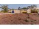 Single-story house with a navy blue garage door and well-manicured lawn at 386 Marion Oaks Trl, Ocala, FL 34473