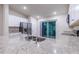 Kitchen island with granite countertop and double sink at 386 Marion Oaks Trl, Ocala, FL 34473