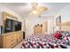 Cozy bedroom with comfortable bed, bright dresser, and stylish decor at 4000 San Gallo Dr # 102, Kissimmee, FL 34741