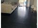 Living room with dark hardwood floors and access to a patio at 428 Sand Lime Rd, Winter Garden, FL 34787