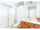 Clean bathroom with shower, toilet and wood vanity at 4525 Stella St, Kissimmee, FL 34746