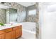 Elegant bathroom with soaking tub, shower, and updated vanity at 4525 Stella St, Kissimmee, FL 34746