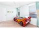 bedroom with race car bed and cheerful decor at 4525 Stella St, Kissimmee, FL 34746